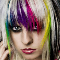 Woman with rainbow hair in a short bob